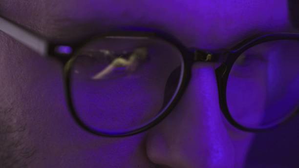 istock Close up of young man using digital device and watching dj party show 2155826845