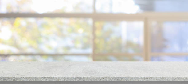istock blur inside interior on modern living room on the opened glass window with cement tabletop shelf for show or advertise or promote product and content on display and web design element concept 2155827025