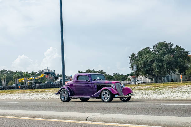 Gulfport, MS - October 05, 2023: Wide angle front corner view of a 1934 Ford Deluxe 3 Window Coupe at a local car show.