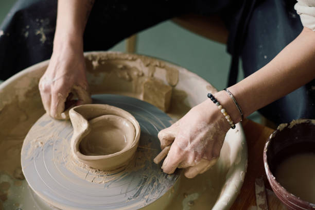 istock Shaping Vessel On Potters Wheel 2155832893