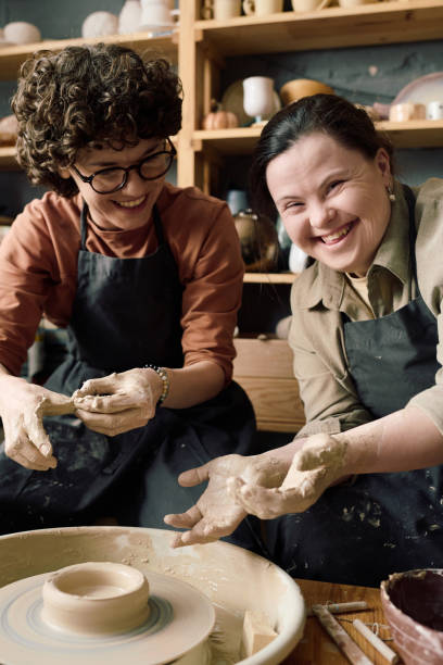 istock Cheerful Diverse Women During Pottery Class 2155833738