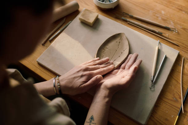 istock Unrecognizable Woman Making Clay Plate 2155834409