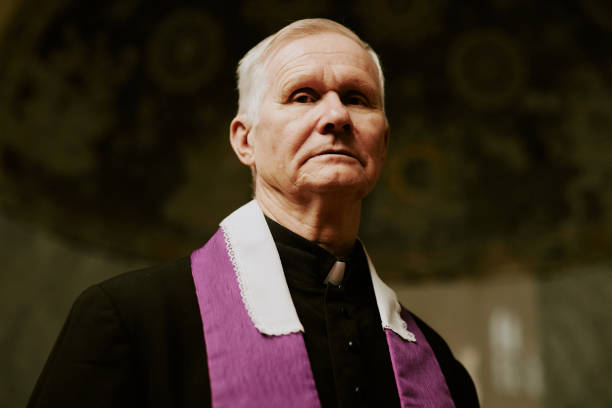 istock Senior Caucasian Pastor Looking At Camera 2155837042