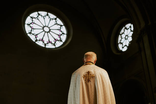 istock Unrecognizable Senior Man Working In Catholic Church 2155837568
