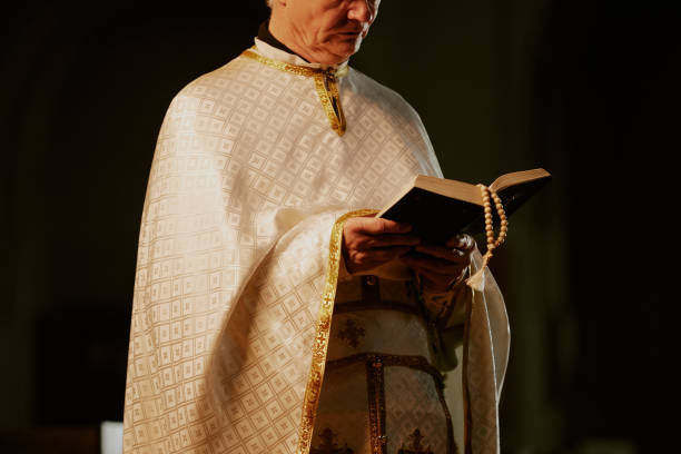 istock Elderly Preacher Reading Bible 2155837573