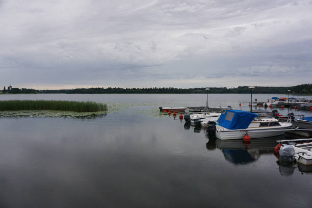 istock Small boats docked at a marina 2155840911
