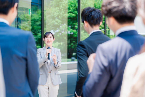 istock Young woman speaking with microphone 2155843339