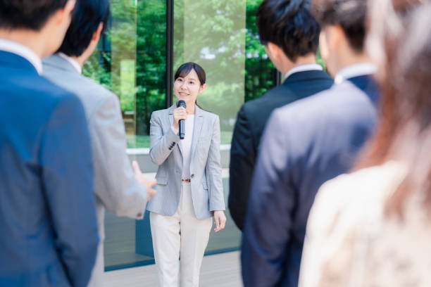 istock Young woman speaking with microphone 2155843340