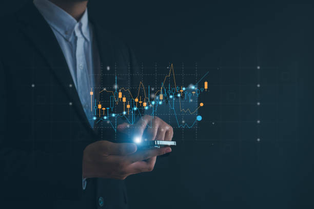istock Businessman analyzing forex trading graph financial data. Business finance background.business finance technology and investment concept. Stock Market Investments Funds and Digital Assets. 2155843365