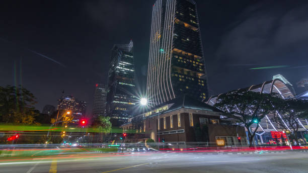 istock Beach Road with skyscrapers and night traffic in Singapore timelapse hyperlapse. 2155844105
