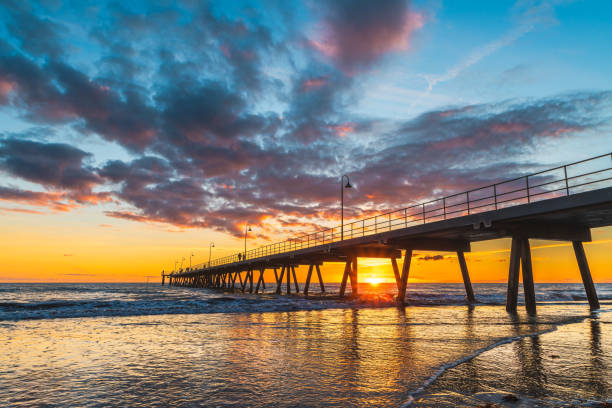 istock Glenelg Beach pier with people silhouette at sunset 2155847197
