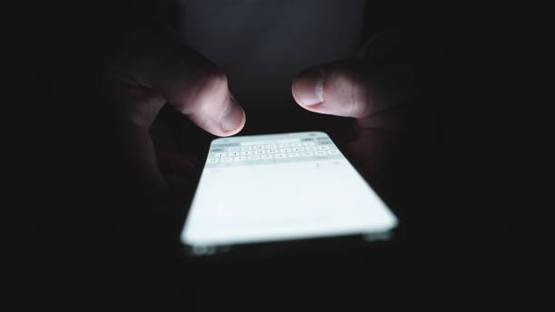 istock Hands of man chatting on the mobile phone, typing message. Slow motion 2155850627