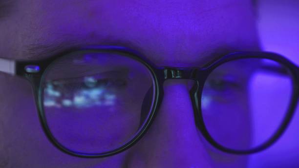 istock Man in glasses enjoying entertainment performance on the gadget, Slow motion 2155850920