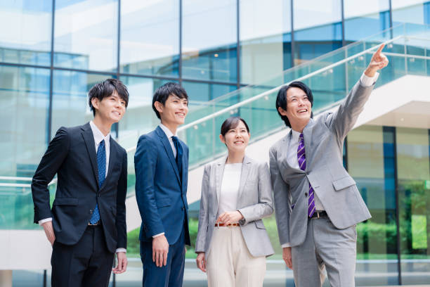 istock Business people pointing to the future with a smile 2155851302