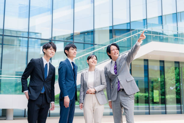 istock Business people pointing to the future with a smile 2155851305