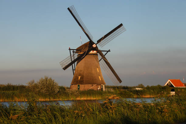 Beautiful old windmills in Kinderdijk. Autumn morning in Holland, Netherlands.