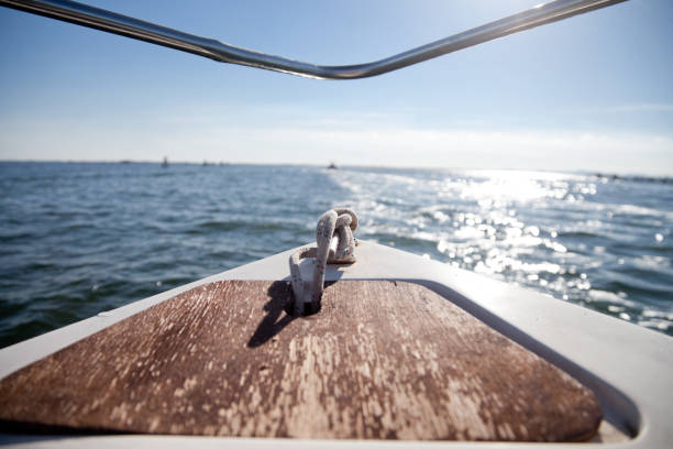 Photograph of a fisherman boat sailing in the sea.