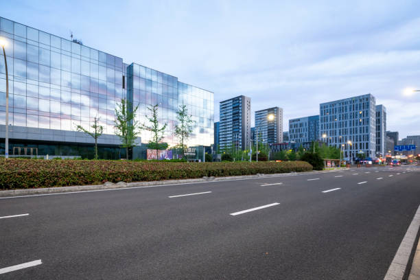 istock Empty asphalt road in front of modern city buildings 2155854129