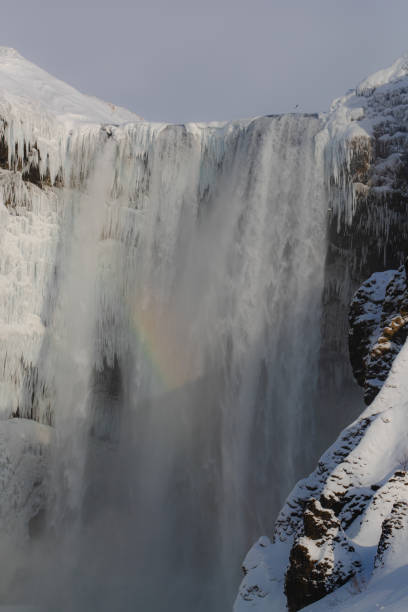 istock Snow-covered rocky mountain with icicles in Iceland 2155865340