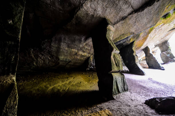 istock A cave with a dark, narrow passage 2155866678