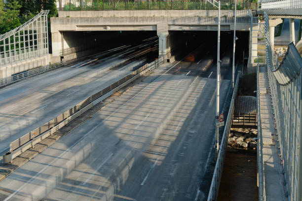 istock Empty urban highway with a pedestrian bridge overhead 2155868088