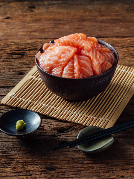 istock Salmon Sashimi on wooden background 2155868496
