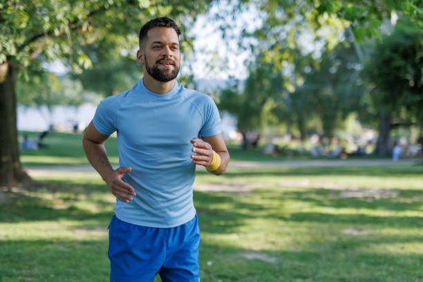 istock Man running with focus and energy 2155870423