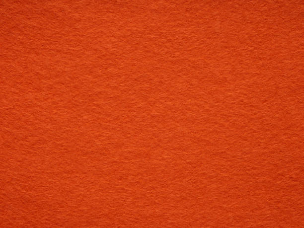 istock Orange felt texture. Saturated background for Christmas desktop. 2155871732