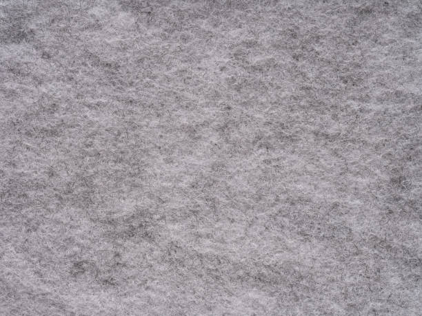istock Soft grey felt material blank. Surface of felted fabric texture. 2155872806