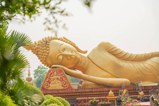 istock Sleeping buddha at Pha That Luang, Vientiane Laos 2155874112