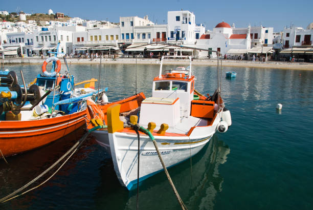 Mykonos, Greece – May 11, 2011: The boats docked on a sunny day in Mykonos, Greece