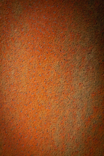 Beautiful rusty sheet metal texture background.  Copy space for design. Vertical image.