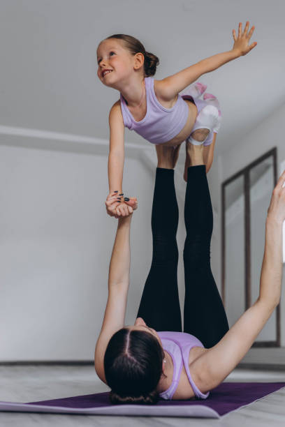 istock children's gymnastics and muscle stretching exercises 2155877502