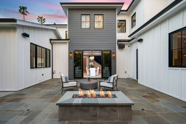 istock a stone fire pit is on the patio of a home 2155879420