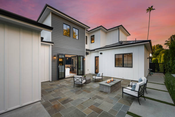 istock two chairs sitting on the patio near a fire pit with fire pits 2155879507