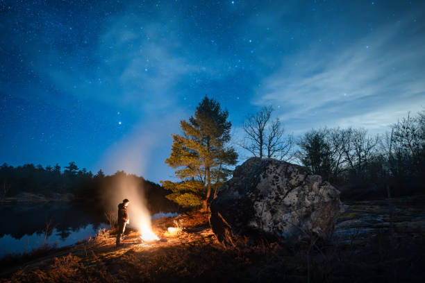 istock Canadian explorer under the night sky 2155880361