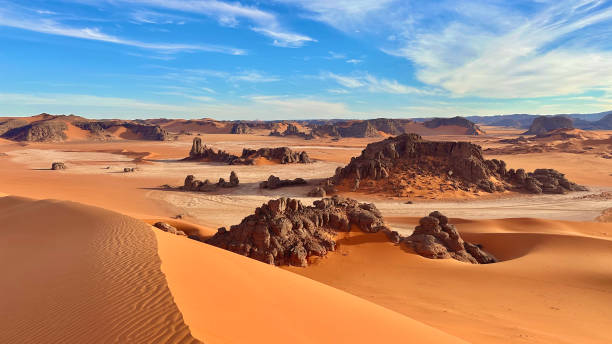istock Scenic view of sandy dunes in a sunny desert 2155881110
