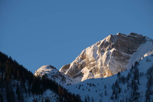 istock the mountains have snow on them under a clear blue sky 2155881314
