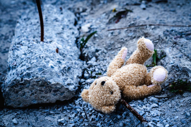 Conceptual image: Russia's war against Ukraine.  Broken toys. Copy space.