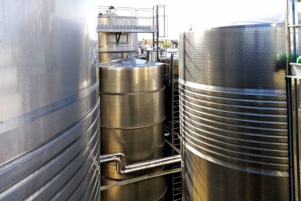 The tall cylindrical tanks at an industrial site