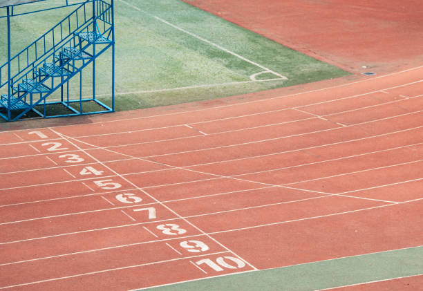 istock Young student doing long-distance running on a red university track in Wuhan. 2155882487