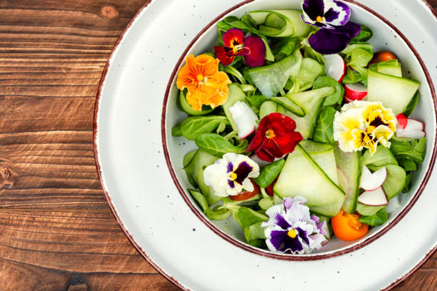 istock Salad of vegetables and flowers. 2155883007