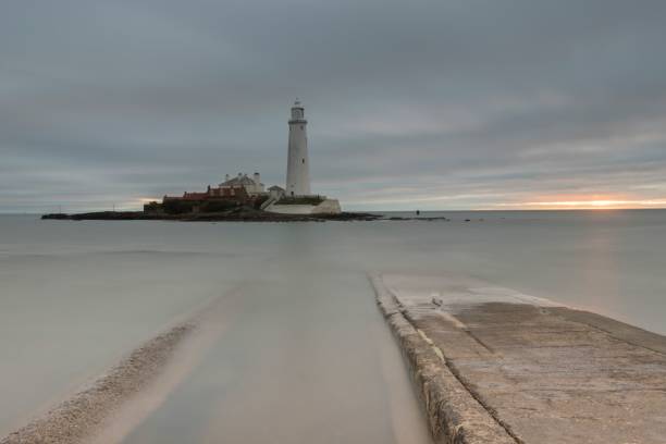 istock Scenic view of Saint Mary's Lighthouse captured during sunrise 2155883323