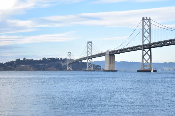 istock Spacious bridge over the water near trees and homes. 2155884634