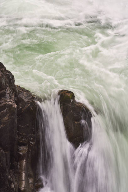 istock Water cascading over a cliff at Little Qualicum Falls. 2155884827