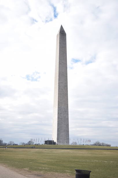 istock Iconic Washington Monument against a cloudy sky 2155885203