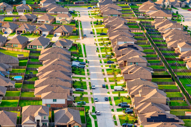 istock Suburban Subdivision Aerial 2155885542
