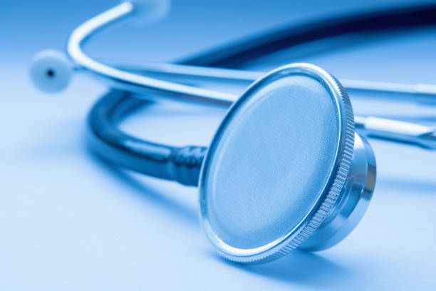 Medical tool stethoscope on light background, closeup.Cardiology and health care concept. Macro image.