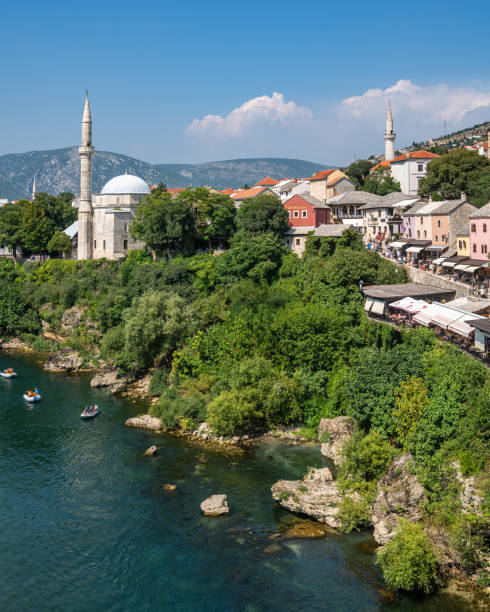 istock Neretva River Meandering Through a Lush Green Hillside in Mostar 2155888572
