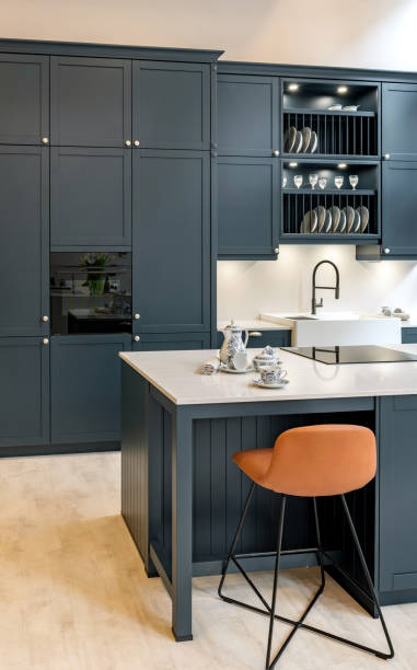 istock Beautiful modern grey kitchen with white counter top on kitchen island 2155890774